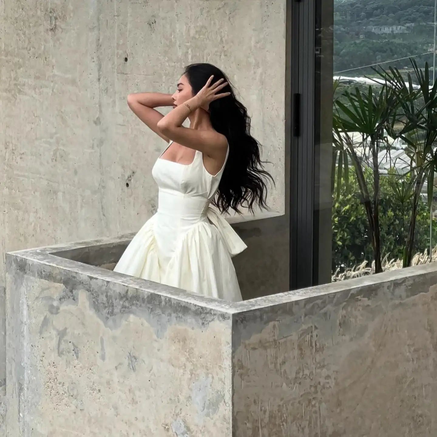 Elegant White Backless Dress with Bow